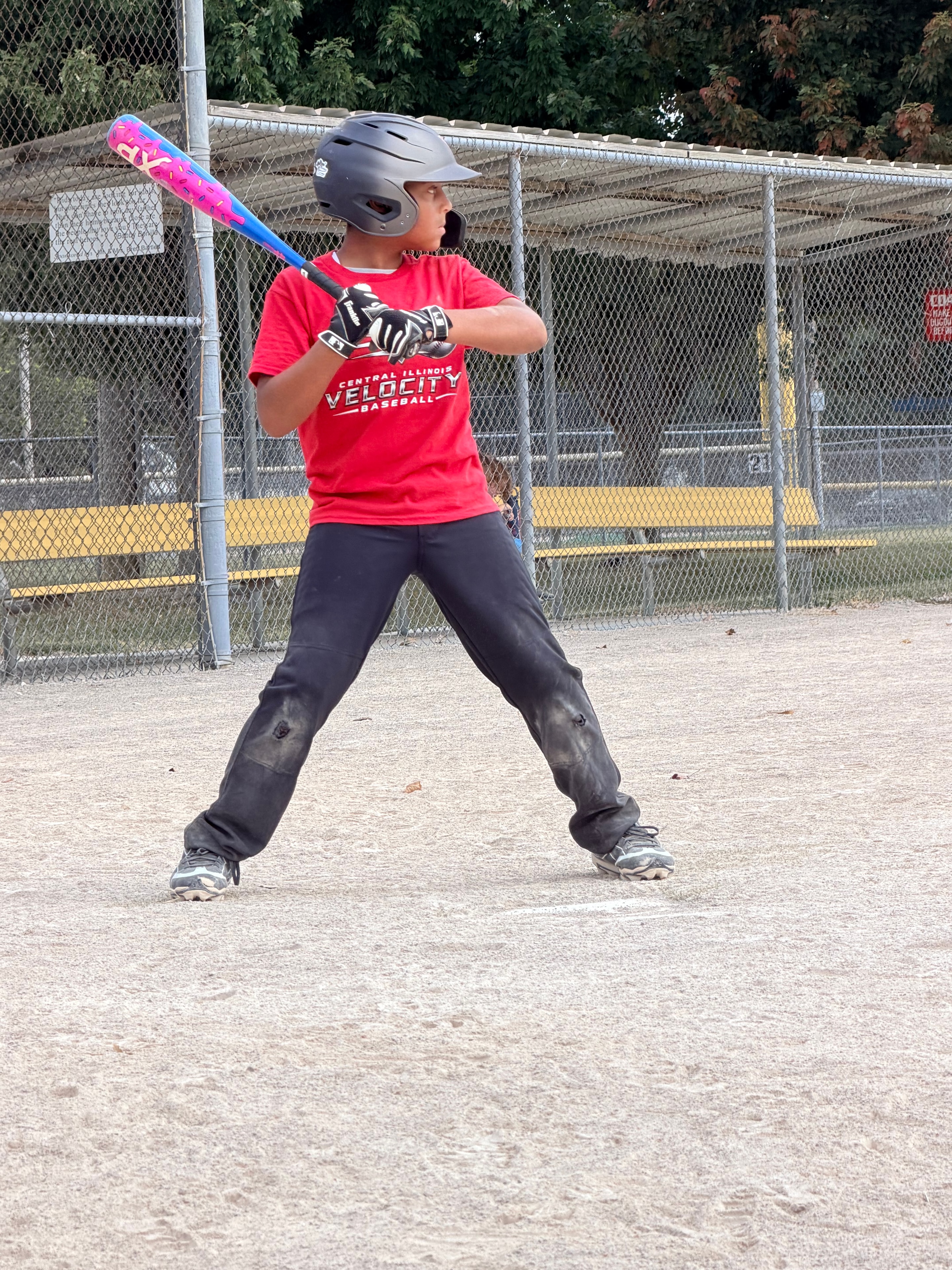 Velocity batter following through on a swing