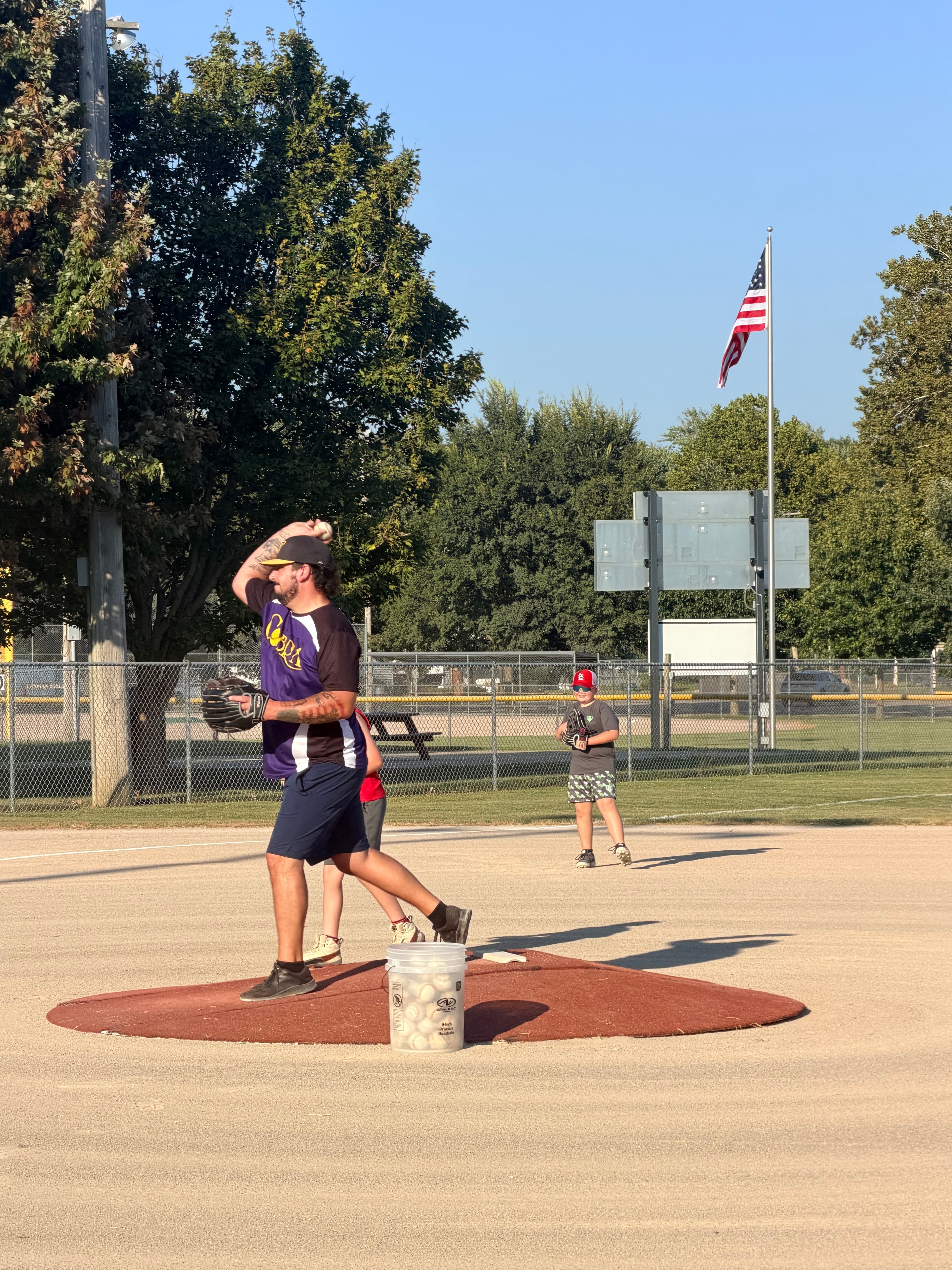 Velocity player practicing pitching on the field