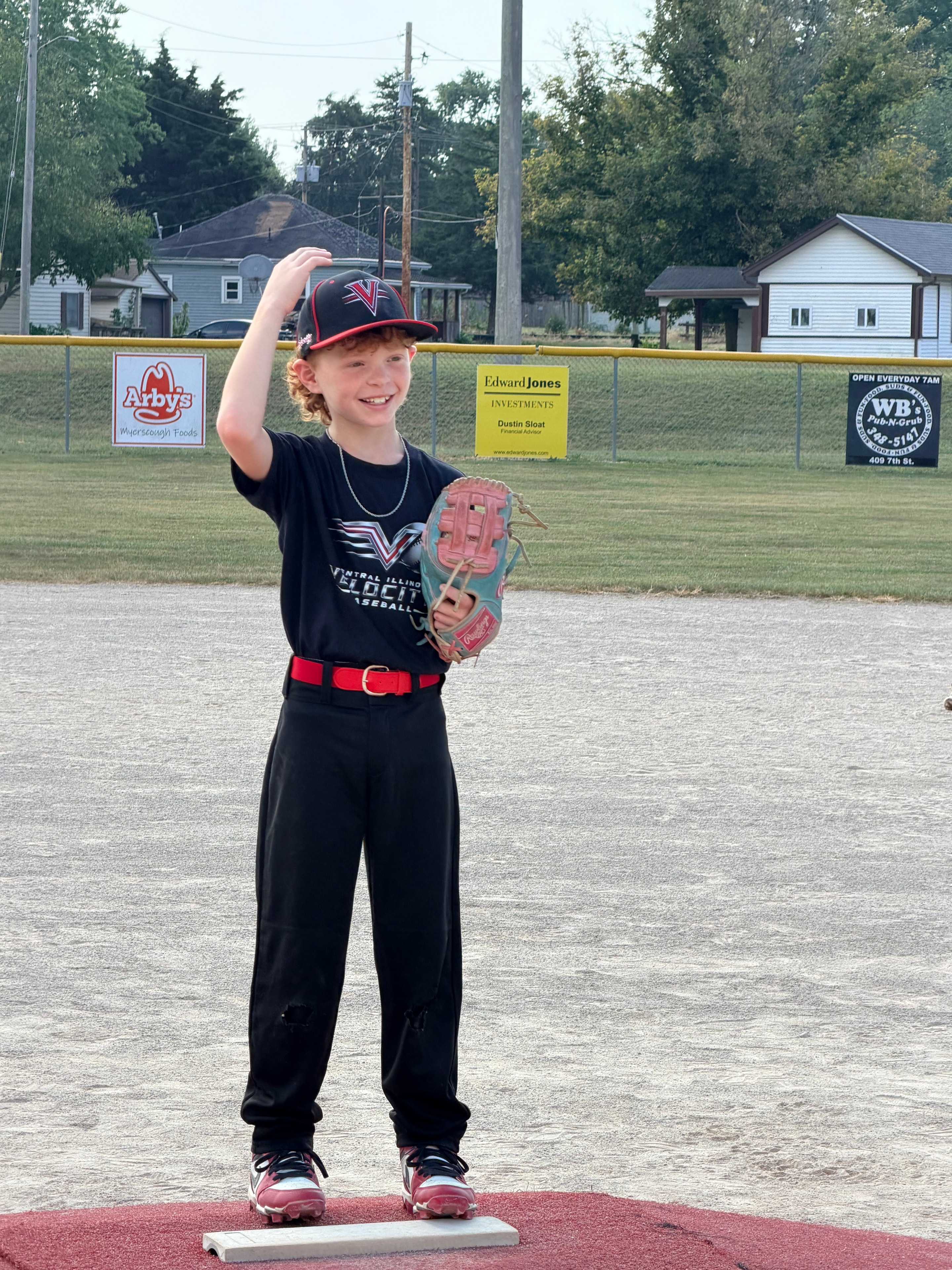 Velocity player with glove ready at base