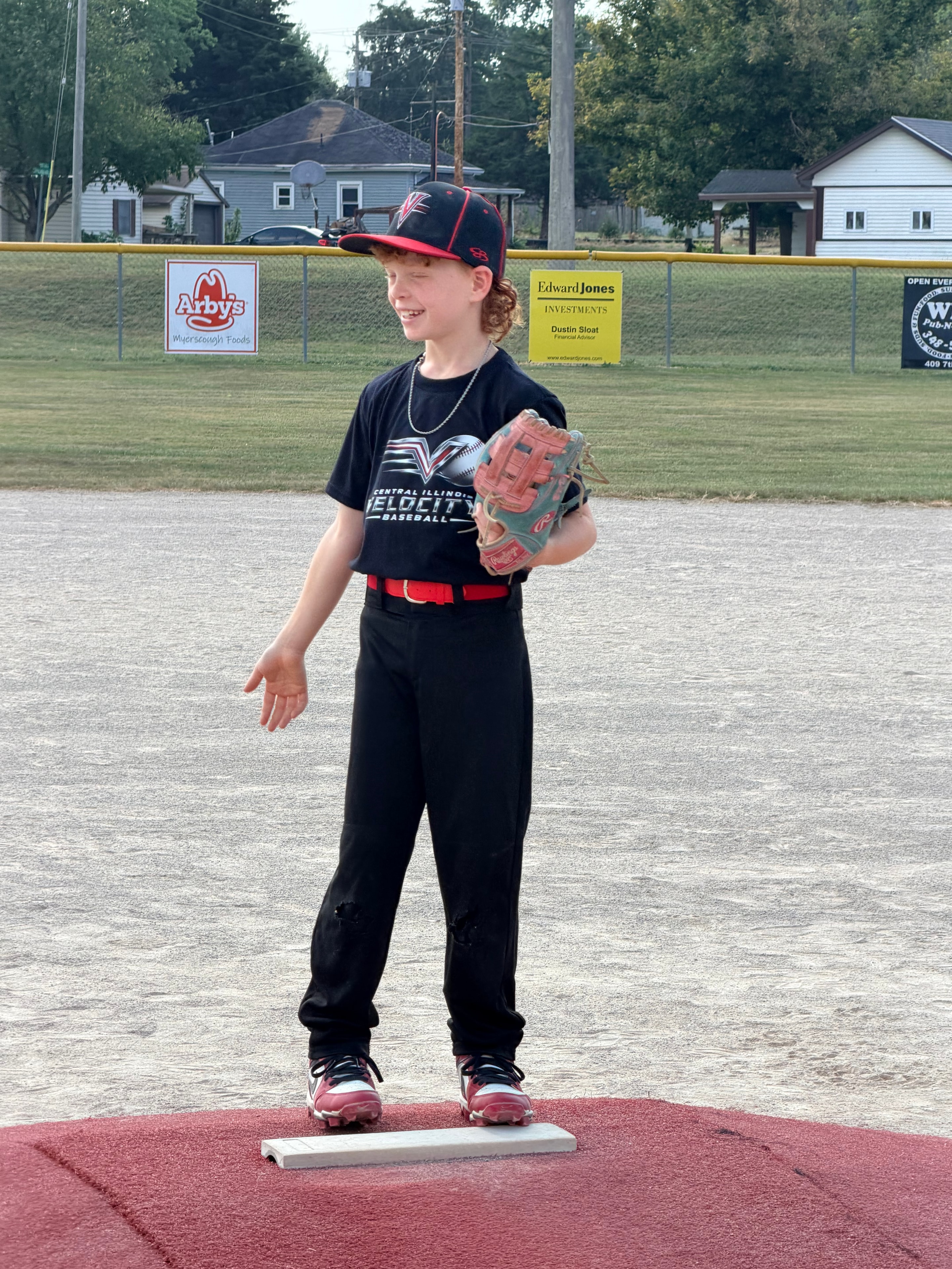Velocity player in red jersey near the scoreboard