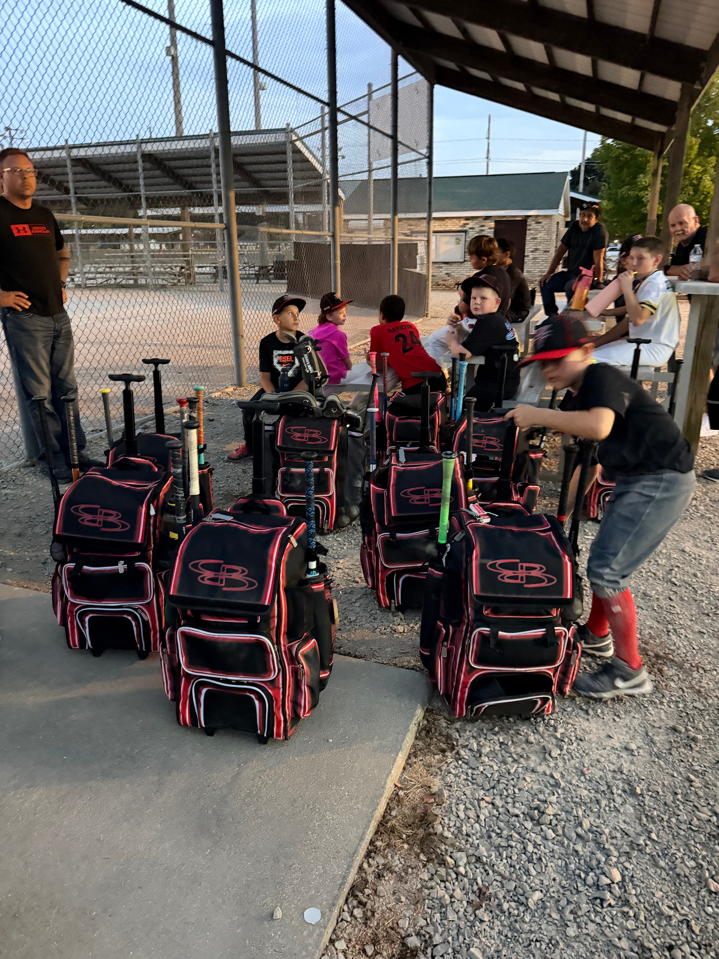 Team gear bags lined up before the game